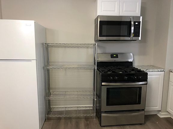 New refrigerator. Gas range. New microwave