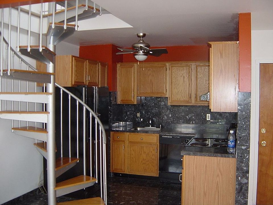 Kitchen & stair to loft