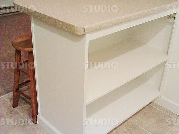 Extra storage in breakfast bar w/electrical outlets for small appliances
