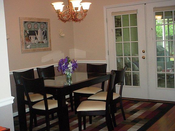dining room with french doors leading to Florida room