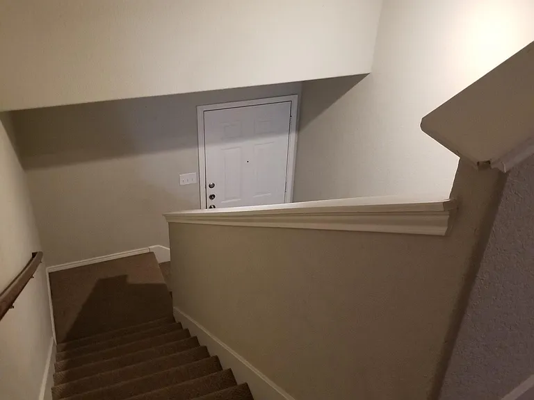 Upstairs landing overlooking front entry