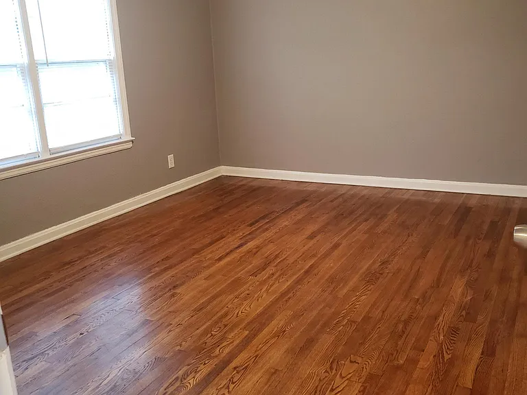 Primary bedroom is huge with large closet (not in photo).. EASILY accomodates a king bed and other furniture.