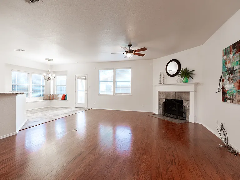 Family Room with fireplace and open to kitchen and breakfast nook
