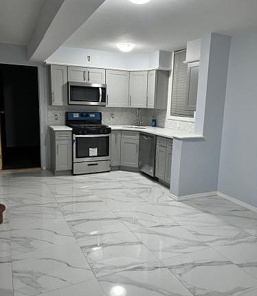 3rd image of 1557 E 56th St Floor 1