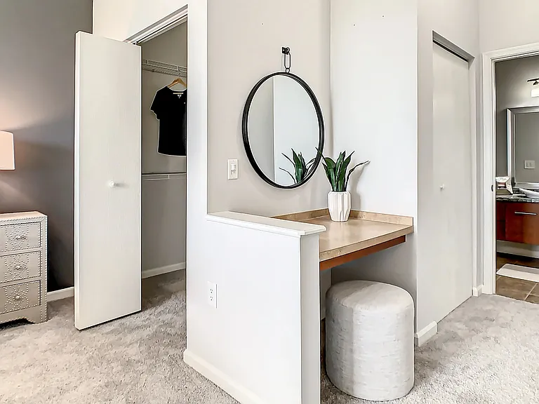 Experience luxury with an added vanity area in the primary bedroom's hallway, leading to magnificent primary bath, an ultimate pampering retreat.