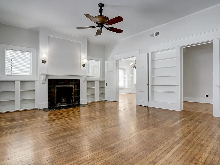 Working fireplace & built-in bookcases.