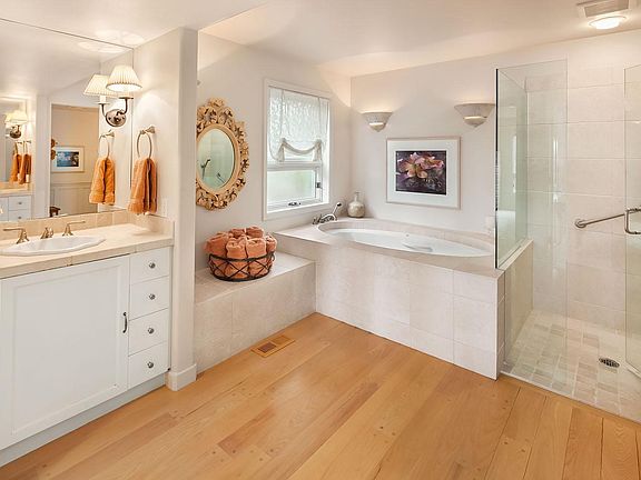 Master bath with tub and shower.