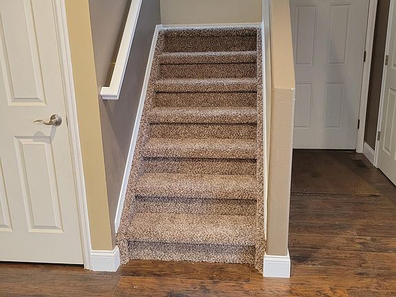 Newly carpeted stairs and upper bedrooms