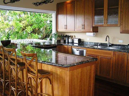 Fully functional kitchen with stove/oven, microwave, refrigerator, dishwasher and includes dishes, pots n pans, etc.
