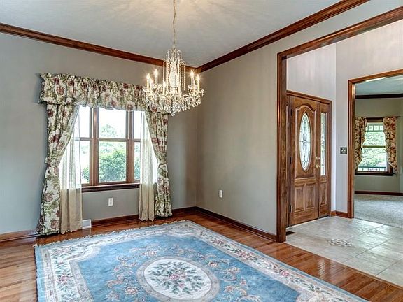 Dining room features hardwood floors.