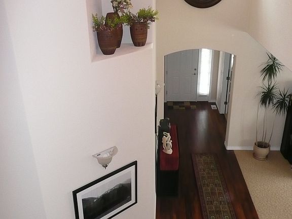 view of foyer from top of stairs