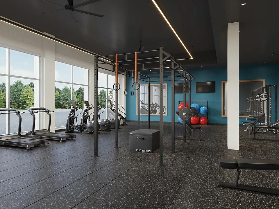 Club-quality fitness studio with spin bikes and personal workout pods at Modera Shoreline in Shoreline, WA.