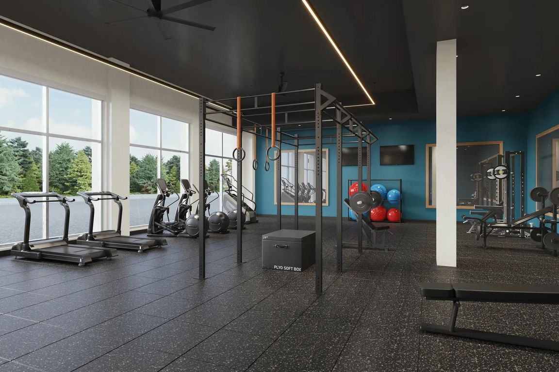 Club-quality fitness studio with spin bikes and personal workout pods at Modera Shoreline in Shoreline, WA.