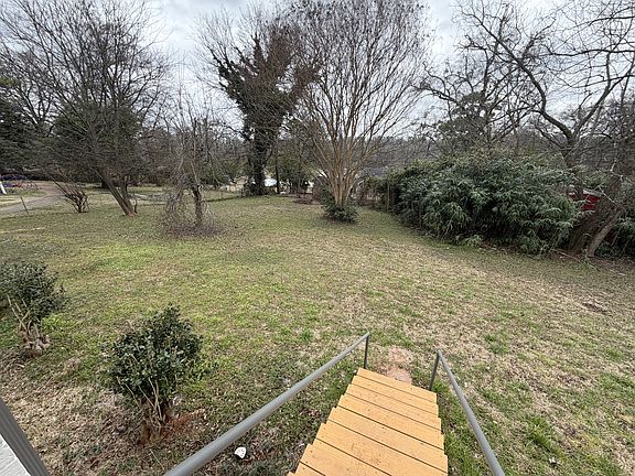 Large, fenced in backyard