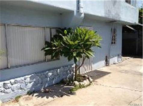 Front of downstairs 1 br 1 bth unit was rented for $1000 mo