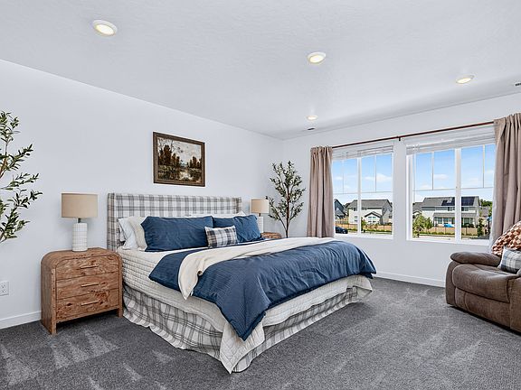 Master Suite with 60" Smart TV & Reclining Rocking Chair