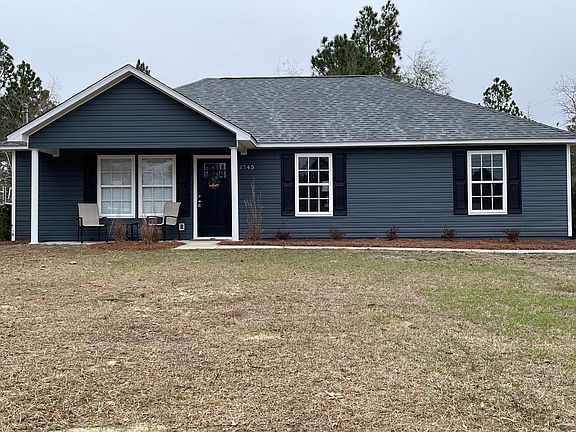 Nice spacious front and back yards.