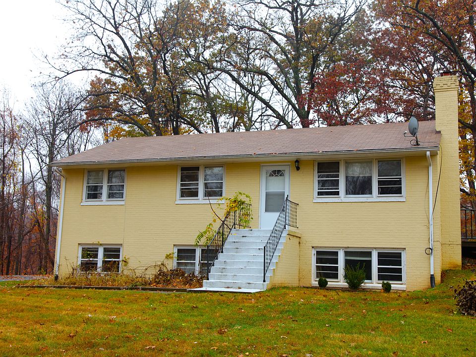 Front of house overlooking large open lawn