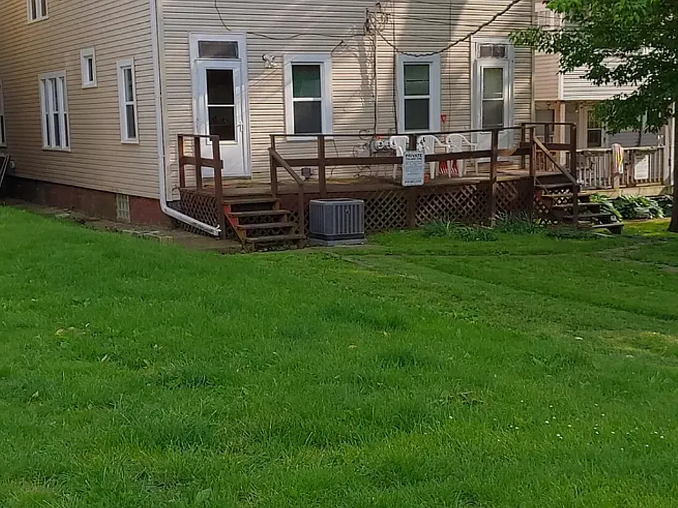 New siding and windows and a spacious backyard