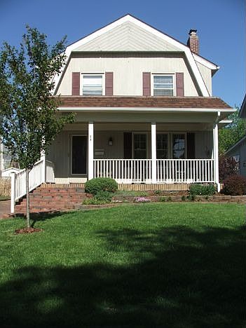 Imagine warm summer nights relaxing on your covered front porch.