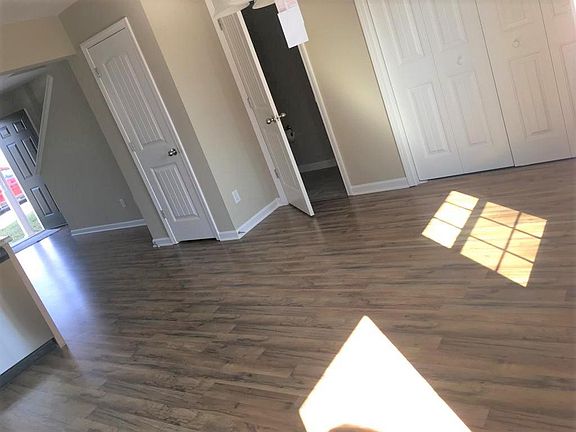 View from kitchen - Coat Closet, half bath & Laundry Rm