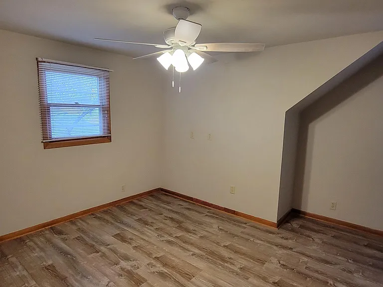Primary bedroom upstairs- New LVP flooring