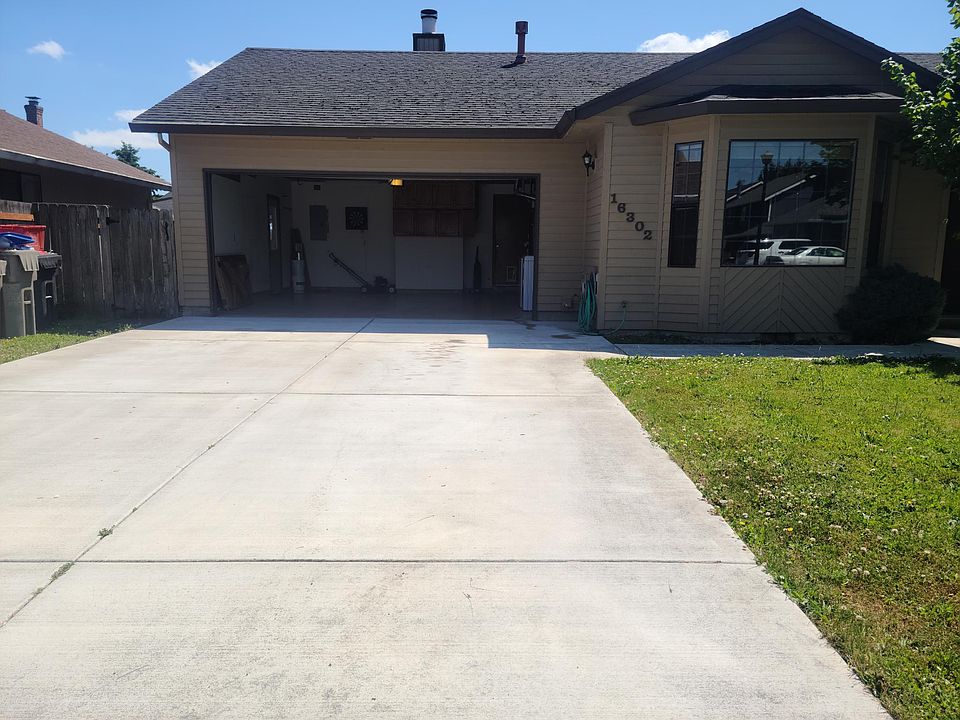 single level house with a 2 car garage.