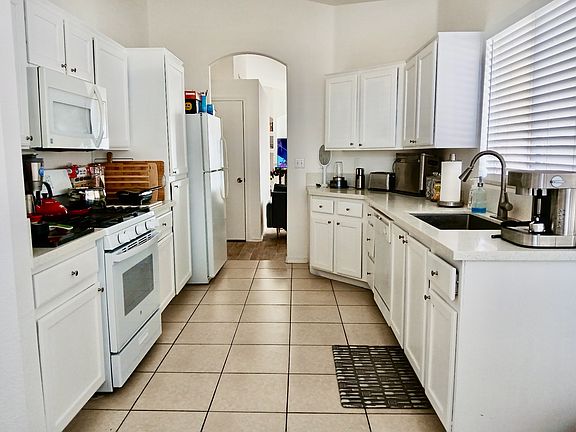 Kitchen with Dishwasher, Stove, Fridge, Microwave