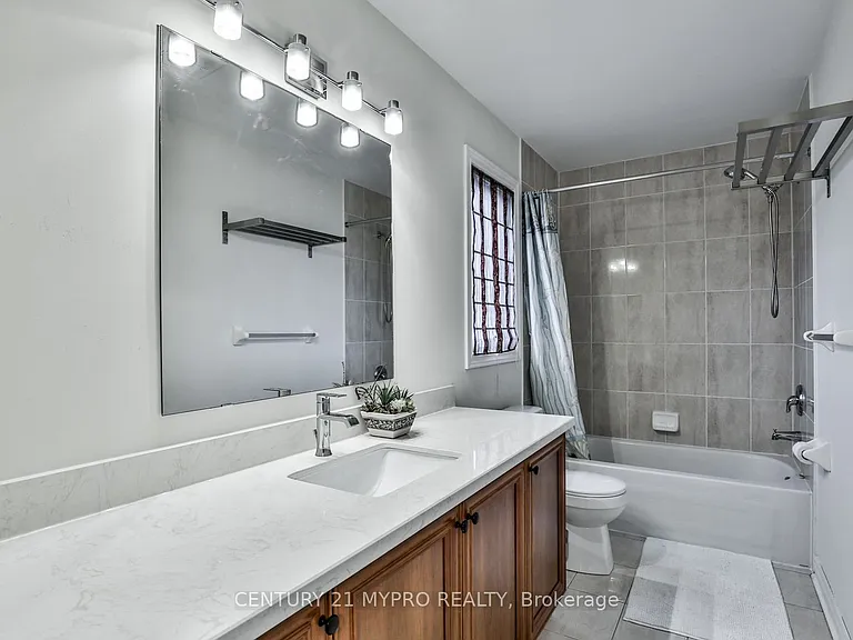 431 Woodspring Ave E — Photo 35