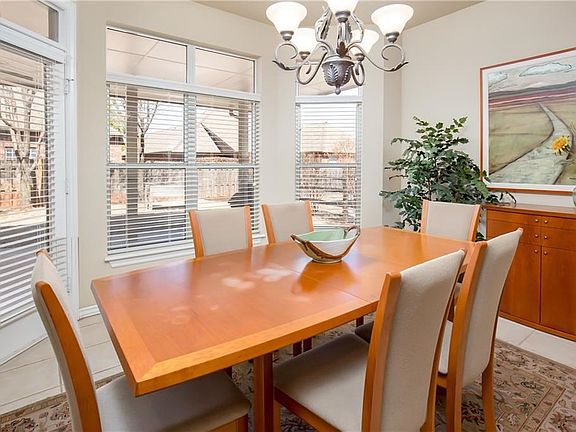 Nice tall ceilings and detailed trim create a finished comfortable space.  Looking back toward the study emphasizes the flexibility of the wood floored room as a room for many uses.