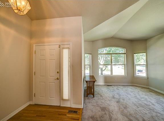 Facing the entrance & living room, lovely large windows in the front!