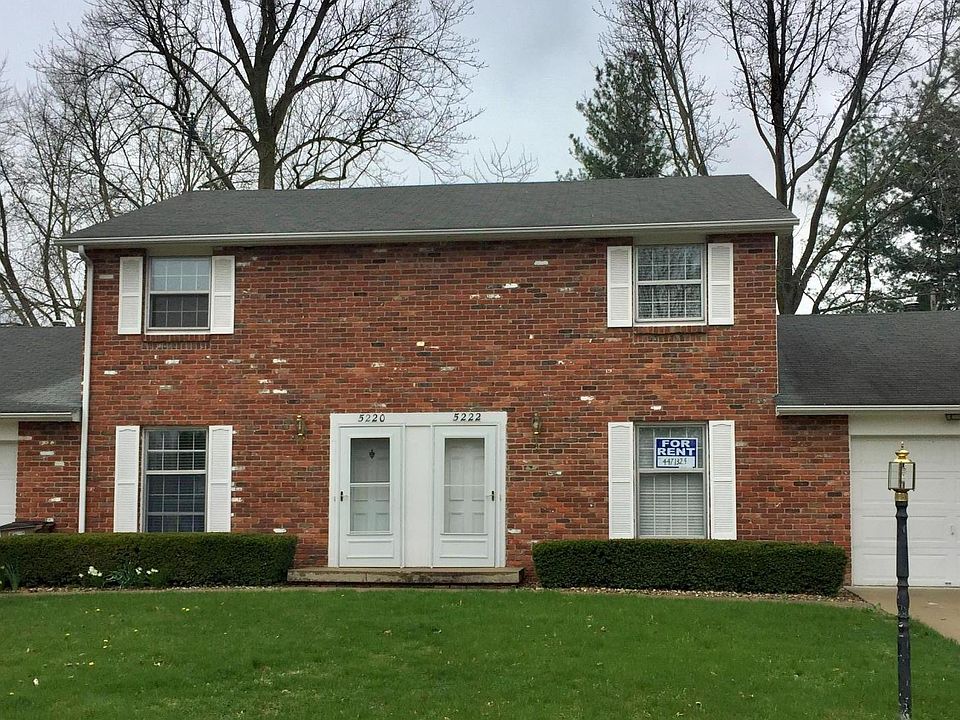 Brick Exterior and one car garage with attic storage. Recent