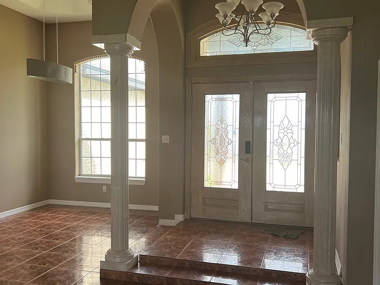 Bright and open layout as you walk in _ perfect for a formal dining area, home office, or additional sitting space.