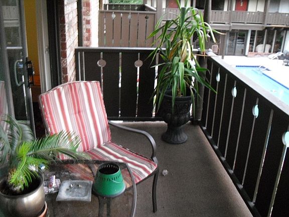 Balcony overlooking pool