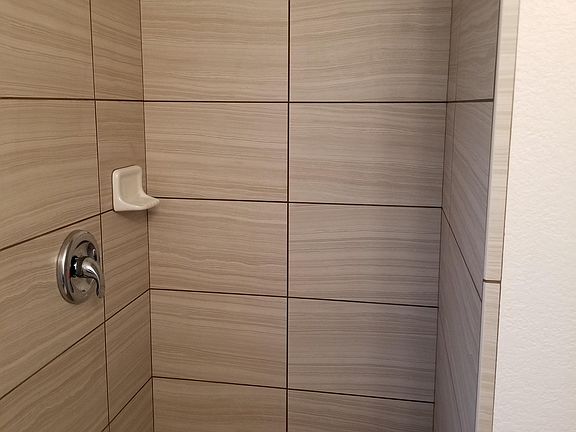 Downstairs full bathroom including shower