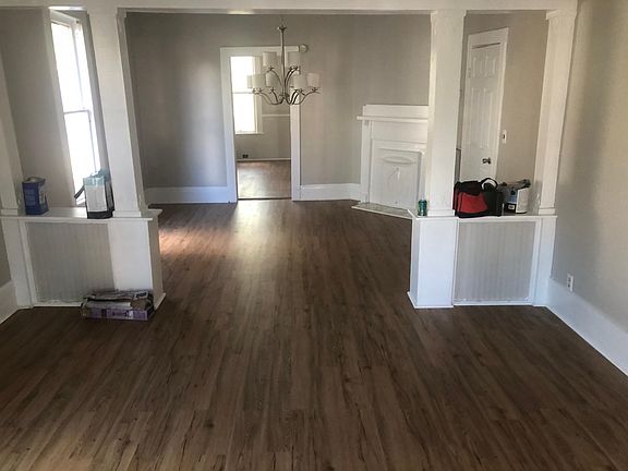 Inside front door looking through to kitchen in back