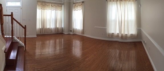 Panoramic view of Entry and Living room