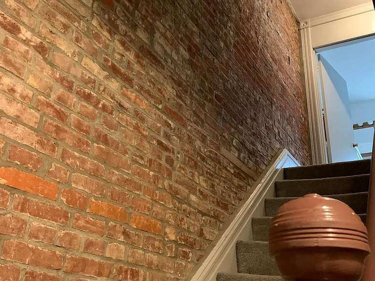Staircase with Exposed Brick