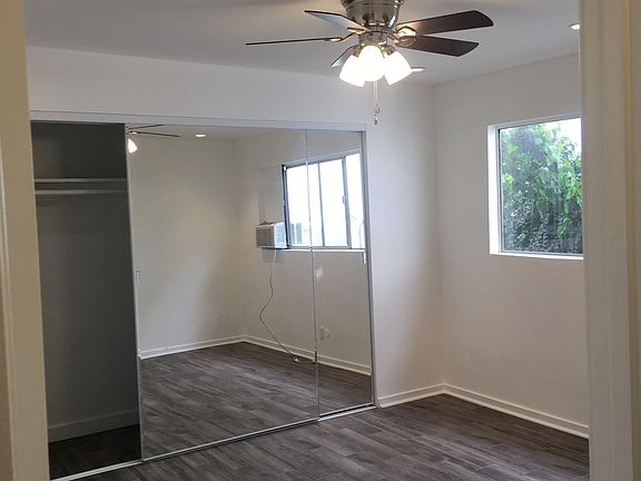 New flooring in bedroom and recessed lights.