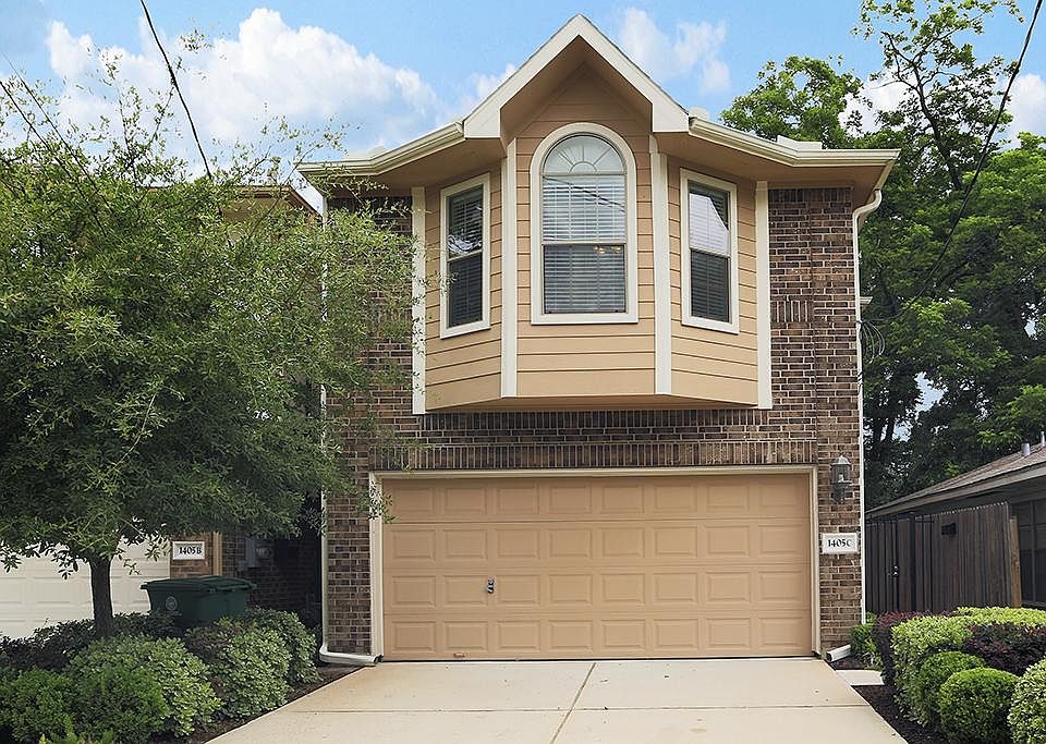 Front view free standing beautiful Heights home