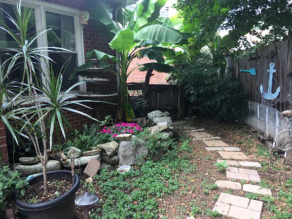 Rustic fence and flower bed
