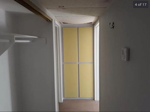 Hallway with closet