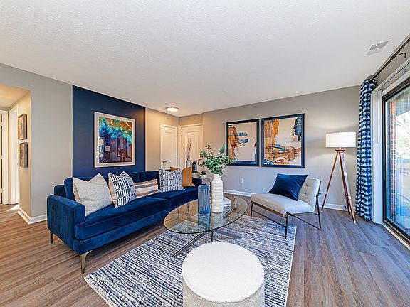Spacious living room with hardwood-style flooring
