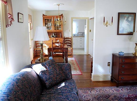 Hardwood floors flow into the dining room.