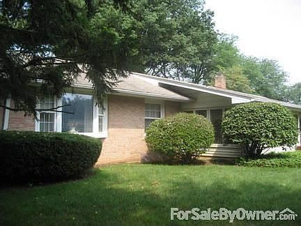 Rear Yard
						:
						Shrubs provide privacy for the sunroom.