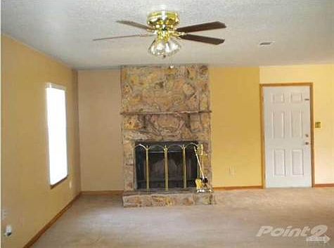 Great Room Has a Stone Front, Wood Burning Fireplace