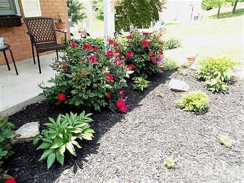 Attractive and well maintained landscaping beds give this home great curb appeal.
