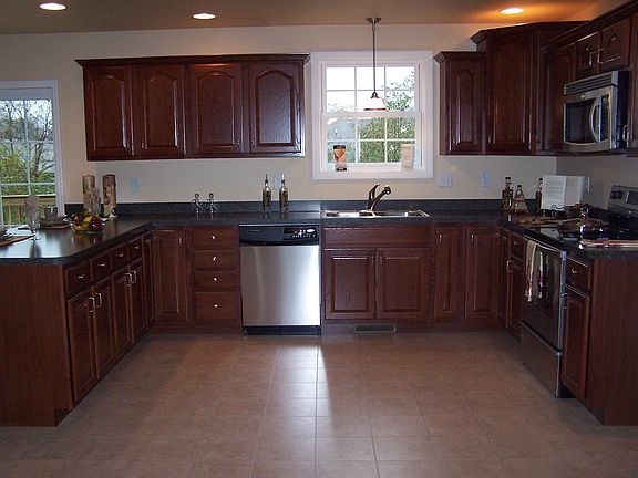Kitchen Also Features Double Pantries & Stainless Appliances