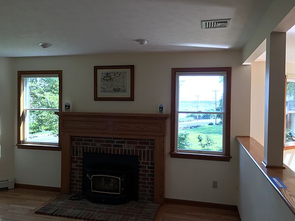 Fireplace and new wood floor