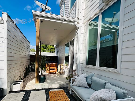 Back patio seating area and covered porch